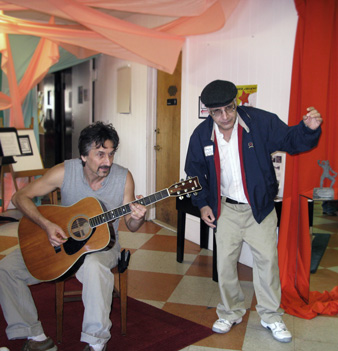Academy House residents participating enjoying musical entertainment